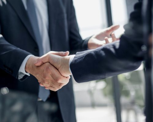 Executives,Shaking,Hands,In,Front,Of,Their,Manager,And,A Executives,Shaking,Hands,In,Front,Of,Their,Manager,And,A